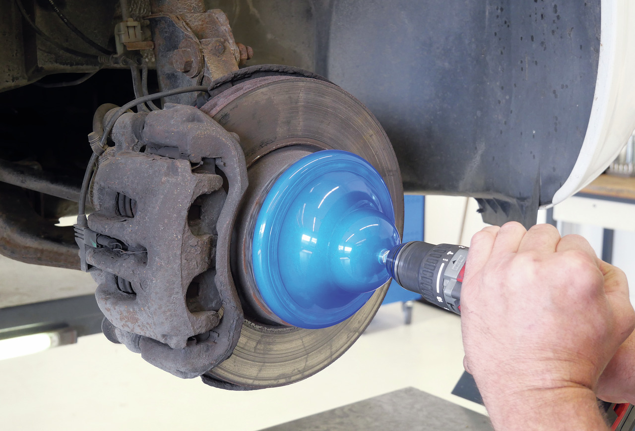 Wheel hub/rim flange grinder